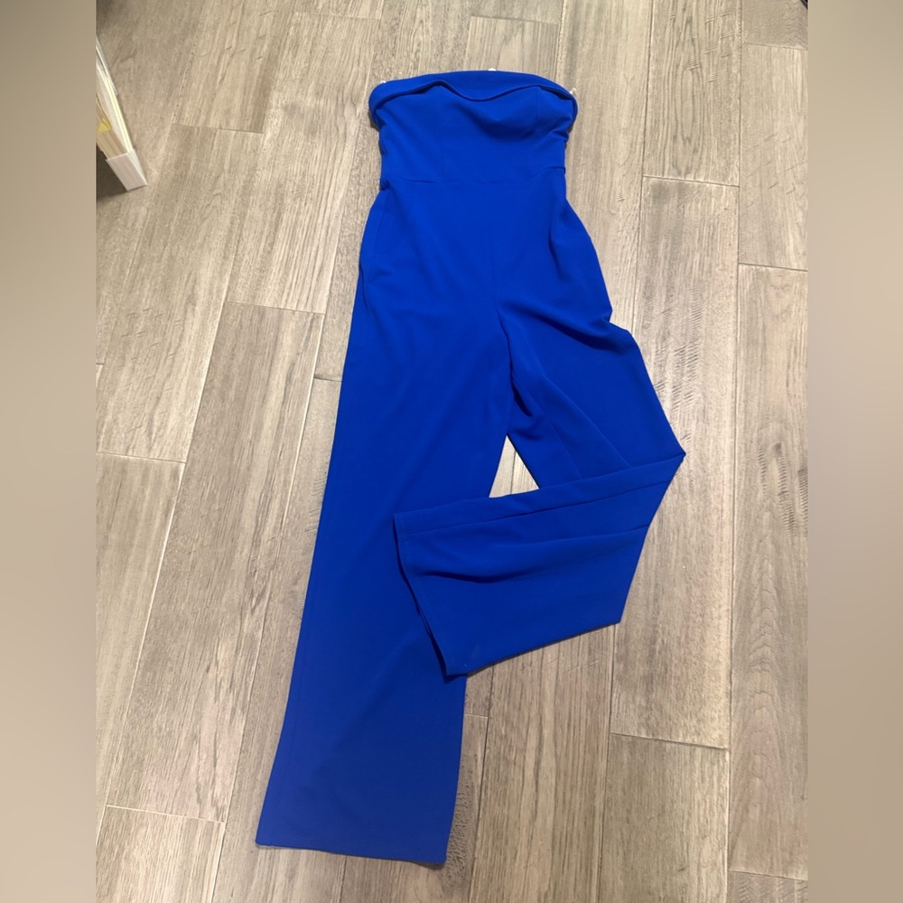 New with tags size small one piece jumpsuit